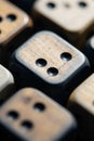 Close up macro view of dice faces revealing intricate patterns and textures. Extreme macro photography of the faces of several Royalty Free Stock Photo