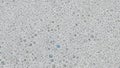 Close Up Macro View Of Numerous Small Bubbles In A White Foam Texture abstract background Royalty Free Stock Photo