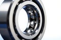 Close up macro view of a shiny metal ball bearing with rolling elements Royalty Free Stock Photo
