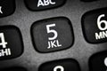 A close up macro view of a telephone handset number keypad