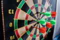Close up on Magnet Darts on the Target Royalty Free Stock Photo
