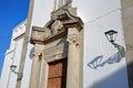 Close-up on the main entrance to the Catholic church Nossa Senhora do Carmo, located in the old town of Tavira, Algarve Royalty Free Stock Photo