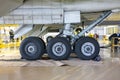 Close-up main landing gear of passenger airplane in the hangar