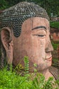 Close up of majestic Giant Leshan Buddha head and face