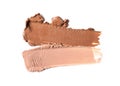 Close-up of make-up swatches. Smears of beige skincare beauty product concealer or foundation