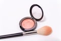 Close up of makeup brush and blush box isolated on white background Royalty Free Stock Photo