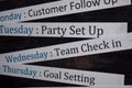 Close up making agenda weekly schedule on personal organizer. Business and entrepreneur concept. Isolated on blackboard