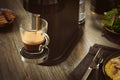Close-up of making coffee in a capsule coffee machine Royalty Free Stock Photo