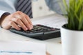 Close up of male accountant or banker calculating Royalty Free Stock Photo
