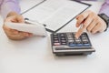 Close up of male accountant or banker making calculations. Savings, finances and economy concept Royalty Free Stock Photo