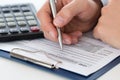 Close up of male accountant making calculations Royalty Free Stock Photo