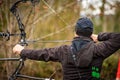 Close-up of a Male Archer Aiming with a Hunting Compound Bow Royalty Free Stock Photo