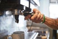 Close Up Of Male Barista Using Coffee Machine In Cafe Royalty Free Stock Photo