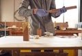 Close Up Of Male Craftsman In Workshop Assembling Hand Built Sustainable Bamboo Bicycle Frame