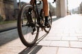 Close up of male cyclist in sport clothes riding bike Royalty Free Stock Photo