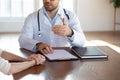 Close up of male doctor consult patient