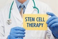 Close-up of a male doctor holding a sign with the text STEM CELL THERAPY Royalty Free Stock Photo