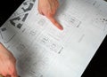 Close up of male engineer sits at the desk in her office,