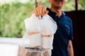 Close-up of male food delivery man on job Royalty Free Stock Photo