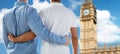 Close up of male gay couple hugging over big ben Royalty Free Stock Photo