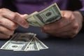 Close up male hand Counting money us dollar. Financial business concept Royalty Free Stock Photo