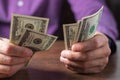 Close up male hand Counting money us dollar. Financial business concept Royalty Free Stock Photo