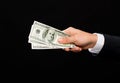 Close up of male hand holding dollar cash money Royalty Free Stock Photo