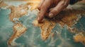 Close up of male hand point finger on Africa on the world map Royalty Free Stock Photo