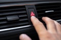 Close-up of male hand, presses the emergency button in car. Royalty Free Stock Photo