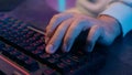 Close up male hand typing computer keyboard working online studying internet e-learning hacker programmer unrecognizable Royalty Free Stock Photo