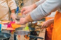 Chef adds pepper to meat at cooking workshop Royalty Free Stock Photo