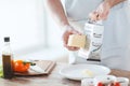 Close up of male hands grating cheese Royalty Free Stock Photo