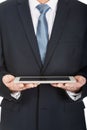 Close up on male hands holding digital tablet Royalty Free Stock Photo