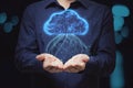 Close up of male hands holding glowing blue digital cloud with binary code on dark blurry bokeh background. Computing and coding Royalty Free Stock Photo