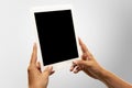 Close up male hands holding tablet with blank screen during online watching of popular sport matches and championships Royalty Free Stock Photo