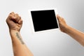 Close up male hands holding tablet with blank screen during online watching of popular sport matches and championships Royalty Free Stock Photo