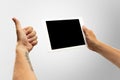 Close up male hands holding tablet with blank screen during online watching of popular sport matches and championships