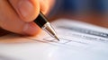 Close-up of male hands with pen over document Royalty Free Stock Photo