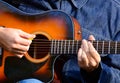 Close up of male hands playing guitar Royalty Free Stock Photo