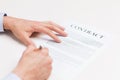 Close up of male hands signing contract document Royalty Free Stock Photo