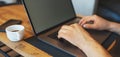 Close-up of male hands typing on laptop. Panoramic banner view. Royalty Free Stock Photo