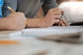 Close up of male hands using a compass Royalty Free Stock Photo