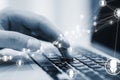 Close up of male hands using laptop on desk with glowing video conference hologram and polygonal connections on blurry background Royalty Free Stock Photo