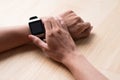 Close up of a male hands using a modern smart watch. Royalty Free Stock Photo