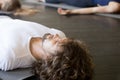 Close up of male head, Savasana pose Royalty Free Stock Photo