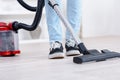 Close up male hoovering carpet Royalty Free Stock Photo