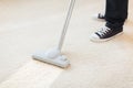 Close up of male hoovering carpet Royalty Free Stock Photo