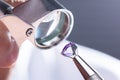 Jeweler Looking At Diamond Through Magnifying Loupe Royalty Free Stock Photo