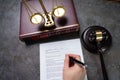 Judge Writing On Paper Royalty Free Stock Photo