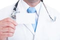 Close-up of male medic holding blank business card